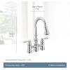 imageMoen S73204ORB Weymouth Two Handle Pulldown Bridge Kitchen Faucet Oil Rubbed BronzeBrushed Gold
